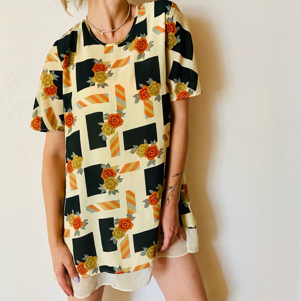 Chloe Cream Floral Mini Dress with Black Blocks and Orange Accents